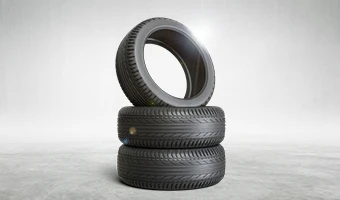 Plusieurs pneu les un sur les autres avec un halo lumineux représentant leur bon état